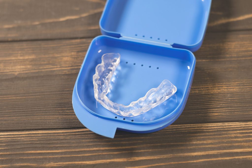 Jaw Pain, Headaches, and Worn Teeth: The Hidden Signs You Might Need a Nightguard